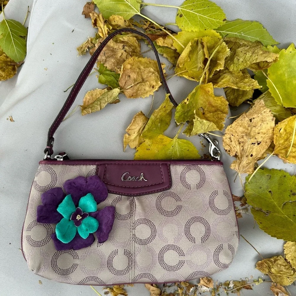 Coach Wristlet with suede flowers. Upstyled for a fresh new look. 9.25x5.5 x1”